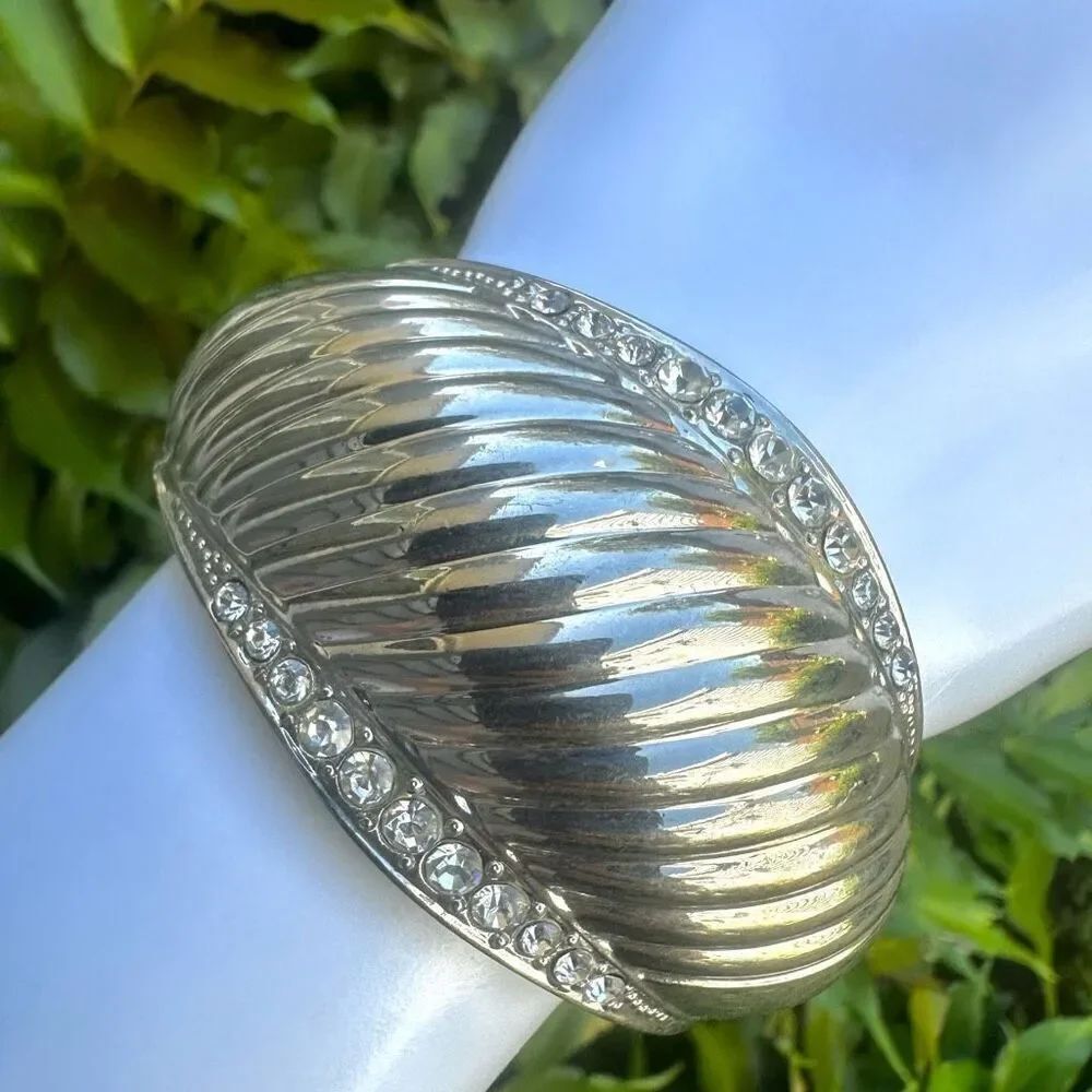 Silver tone rhinestone hinged bangle bracelet